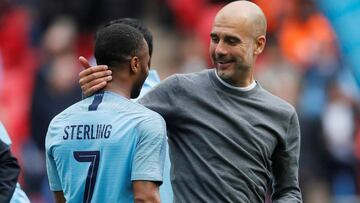 Soccer Football - FA Cup Final - Manchester City v Watford - Wembley Stadium, London, Britain - May 18, 2019 Manchester City manager Pep Guardiola and Manchester City's Raheem Sterling celebrate winning the FA Cup REUTERS/David Kle