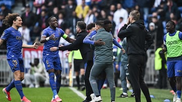 Monaco�s US forward #09 Folarin Balogun (C) celebrates with his teamates after scoring a goal during the French L1 football match between Olympique Lyonnais (OL) and AS Monaco (ASM) at the Groupama Stadium in Decines-Charpieu, central-eastern France on March 22, 2026. (Photo by JEFF PACHOUD / AFP)