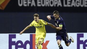 Zagreb (Croatia), 08/04/2021.- Juan Foyth (L) of Villarreal in action against Arijan Ademi (R) of Dinamo Zagreb during the UEFA Europa League quarter final, 1st leg match between Dinamo Zagreb and Villarreal in Zagreb, Croatia, 08 April 2021. (Croacia) EF