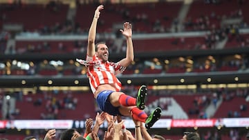 MADRID, SPAIN - MAY 12: Diego Godin of Atletico Madrid is thrown into the air by his teammates during celebrations after his last home match for the club at the end of the La Liga match between Club Atletico de Madrid and Sevilla FC at Wanda Metropolita