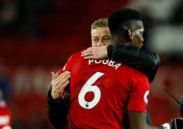 Manchester United interim manager Ole Gunnar Solskjaer celebrates with Paul Pogba after the match