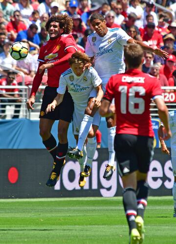 Marouane Fellaini, Luka Modric and Varane