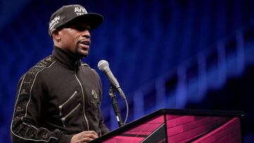 Floyd Mayweather Jr. speaks to the media after his TKO of Conor McGregor