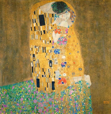 ‘De Kuss’ es una de las obras más notales de la ‘etapa dorada’ del pintor de Baumgarten, Gustav Klimt. Es un óleo con laminillas de oro y estaño sobre lienzo de 180 x 180 centímetros y su creación fue entre 1907 y 1908. Las obras del artista siempre estaban envueltas de polémicas y eran criticadas como pornografía y por ser excesivamente pervertidas. Pero al contrario de esto, esta obra fue recibida maravillosamente por la crítica. ‘El beso’ simboliza una pareja encerrada en la intimidad. Actualmente está expuesta en la Österreichische Galerie Belvedere de Viena.
