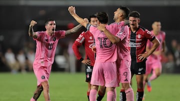 Jul 30, 2025; Ft. Lauderdale, Florida, USA; Inter Miami CF forward Lionel Messi (10) celebrates with forward Luis Suarez (9) and midfielder Rodrigo De Paul (7) after a goal by defender Marcelo Weigandt (not pictured) against Atlas FC during the second half of a group stage Leagues Cup match at Chase Stadium. Mandatory Credit: Sam Navarro-Imagn Images