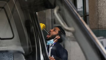 A man takes a polymerase chain reaction (PCR) test from a mobile swab collection vehicle, amid the major second wave of the coronavirus disease (COVID-19) in Kathmandu, Nepal May 19, 2021. REUTERS/Navesh Chitrakar