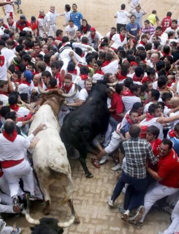 El séptimo encierro de San Fermín 2013, en imágenes