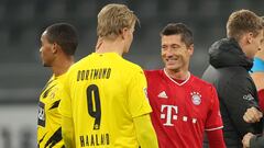 Robert Lewandowski saluda a Erling Haaland tras un partido entre Dortmund y Bayern en la Bundesliga.