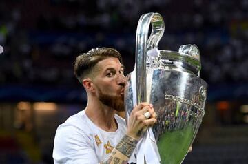 Sergio Ramos of Real Madrid kisses the Champions League trophy after the UEFA Champions League Final