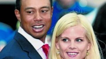 Tiger y Elin, su esposa.