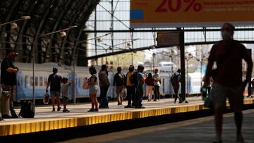 Commuters are seen along a platform next to rail tracks at Retiro train station, during the spread of the coronavirus disease (COVID-19), in Buenos Aires, Argentina October 9, 2020. REUTERS/Agustin Marcarian