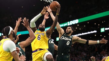 BOSTON, MASSACHUSETTS - JANUARY 28: Jayson Tatum #0 of the Boston Celtics defends LeBron James #6 of the Los Angeles Lakers in the final shot of regulation play during the fourth quarter at TD Garden on January 28, 2023 in Boston, Massachusetts. The Celtics defeat the Lakers in overtime 125-121.   Maddie Meyer/Getty Images/AFP (Photo by Maddie Meyer / GETTY IMAGES NORTH AMERICA / Getty Images via AFP)