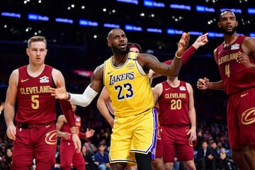 Dec 31, 2024; Los Angeles, California, USA; Los Angeles Lakers forward LeBron James (23) reacts during the first half at Crypto.com Arena.