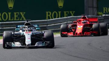 Hamilton con el Mercedes y Vettel con el Ferrari en Hungría.