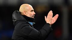 Soccer Football - Premier League - Everton v Manchester City - Goodison Park, Liverpool, Britain - February 26, 2022 Manchester City manager Pep Guardiola applauds fans after the match REUTERS/Peter Powell EDITORIAL USE ONLY. No use with unauthorized audi