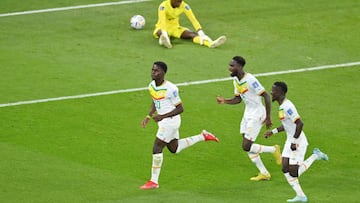 DOHA, QATAR - NOVEMBER 25: Bamba Dieng of Senegal celebrates with teammates after scoring their team's third goal during the FIFA World Cup Qatar 2022 Group A match between Qatar and Senegal at Al Thumama Stadium on November 25, 2022 in Doha, Qatar. (Photo by Dan Mullan/Getty Images)