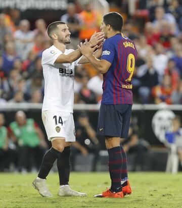 Gayá y Luis Suárez.