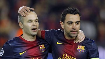 Andrés Iniesta y Xavi Hernández.