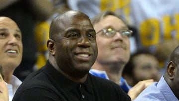 (FILES) This file photo taken on February 8, 2017 shows  NBA legend Earvin &quot;Magic&quot; Johnson during the game between the UCLA Bruins and the Oregon Ducks at Pauley Pavilion in Los Angeles, California.  
 Earvin &quot;Magic&quot; Johnson, who sparked the Los Angeles Lakers to five NBA titles in the 1980s, was on February 21, 2017 named president of basketball operations for the struggling NBA squad. Lakers president and part-owner Jeanie Buss also announced the firing of general manager Mitch Kupchak and vice president of basketball operations Jim Buss, Jeanie&#039;s brother and son of former owner Jerry Buss, who died in 2013.
  / AFP PHOTO / GETTY IMAGES NORTH AMERICA / ROBERT LABERGE