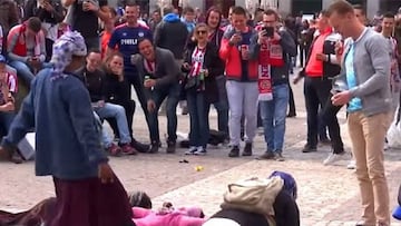 PSV fans make beggars do press-ups for money