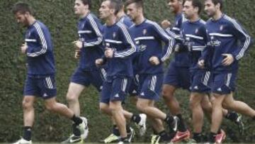 Los jugadores del Osasuna durante el entrenamiento del equipo rojillo esta mañana en las instalaciones de Tajonar.