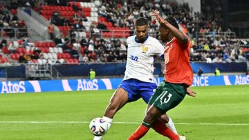 France's midfielder #20 Andy Diouf and Portugal's defender #13 Flavio Nazinho vie for the ball during the UEFA U21 European Championship Group C football match between Portugal and France in Trencin, Slovakia on June 11, 2025. (Photo by Joe Klamar / AFP)