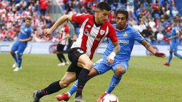 Yuri Berchiche con Damián.