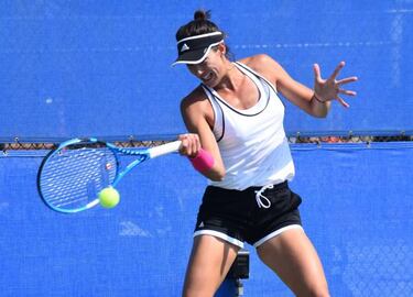 Muguruza out of Rogers Cup as arm issue persists