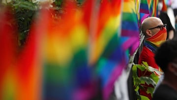 An attendee listens to speakers voice their support for gay pride and black lives matter movements in New York City, New York, U.S., June 25, 2020. REUTERS/Lucas Jackson