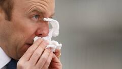 Britain&#039;s Secretary of State for Health Matt Hancock blows his nose at the opening of the NHS Nightingale Hospital, as the spread of the coronavirus disease (COVID-19) continues, London, Britain, April 3, 2020. REUTERS/John Sibley     TPX IMAGES OF T