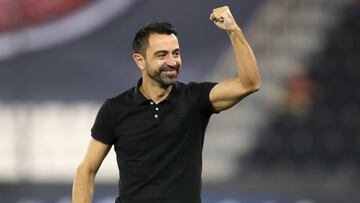 Sadd SC's Spanish coach Xavi Hernandez celebrates after his team scored a goal during the AFC Champions League round of 16 second leg football match between Qatar's al-Sadd and Qatar's al-Duhail at Jassim bin Hamad stadium in Doha on August