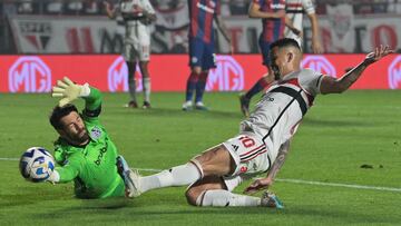 Sao Paulo's forward Luciano strikes and scores a goal past San Lorenzo's goalkeeper Augusto Batalla during the Copa Sudamericana round of 16 second leg football match between Brazil's Sao Paulo and Argentina's San Lorenzo, at the Morumbi stadium in Sao Paulo, Brazil, on August 10, 2023. (Photo by NELSON ALMEIDA / AFP)