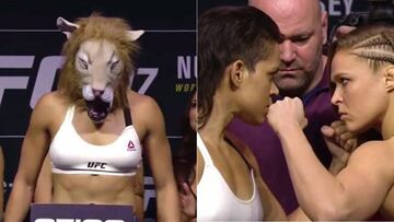 Amanda Nunes posa con una careta de leona durante el pesaje antes del combate del UFC 207 ante Ronda Rousey.