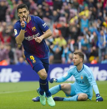 Luis Suárez celebrates scoring the opening goal.