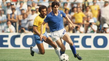 Paolo Rossi of Italy shields the ball from Junior of Brazil during the World Cup Round Two, Group Three match between Brazil and Italy held at the Sarria Stadium, Barcelona, Spain on July 5, 1982.