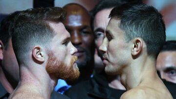 LAS VEGAS, NV - SEPTEMBER 15: Boxer Canelo Alvarez (L) and WBC, WBA and IBF middleweight champion Gennady Golovkin face off during their official weigh-in at MGM Grand Garden Arena on September 15, 2017 in Las Vegas, Nevada. Golovkin will defend his titles against Alvarez at T-Mobile Arena on September 16 in Las Vegas. Ethan Miller/Getty Images/AFP
== FOR NEWSPAPERS, INTERNET, TELCOS & TELEVISION USE ONLY ==