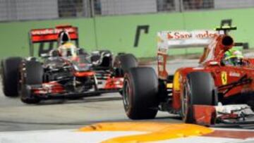 <b>PIQUE. </b>Massa por delante de Hamilton en el circuito de Marina Bay.