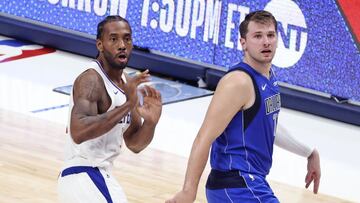 Jun 4, 2021; Dallas, Texas, USA; LA Clippers forward Kawhi Leonard (2) and Dallas Mavericks guard Luka Doncic (77) react after a Leonard shot during the fourth quarter during game six in the first round of the 2021 NBA Playoffs at American Airlines Center. Mandatory Credit: Kevin Jairaj-USA TODAY Sports