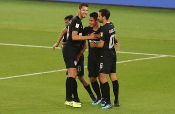 Soccer Football - FIFA Club World Cup Third Place Match - Al Jazira vs CF Pachuca - Zayed Sports City Stadium, Abu Dhabi, United Arab Emirates - December 16, 2017 Pachuca's Roberto Carlos de la Rosa celebrates scoring their third goal with Raul Lopez and team mates REUTERS/Ahmed Jadallah
