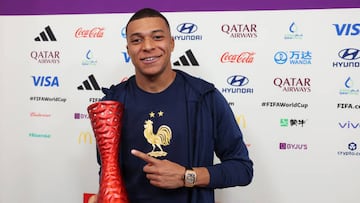 AL WAKRAH, QATAR - NOVEMBER 22: Kylian Mbappe of France poses with the Budweiser Player of the Match Trophy following the FIFA World Cup Qatar 2022 Group D match between France and Australia at Al Janoub Stadium on November 22, 2022 in Al Wakrah, Qatar. (Photo by Mark Metcalfe - FIFA/FIFA via Getty Images)