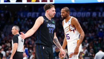 Jan 24, 2024; Dallas, Texas, USA;  Phoenix Suns forward Kevin Durant (35) laughs in front of Dallas Mavericks guard Luka Doncic (77) during the third quarter against the Dallas Mavericks at American Airlines Center. Mandatory Credit: Kevin Jairaj-USA TODAY Sports