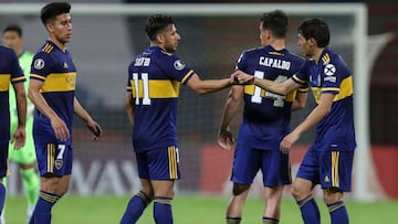 Argentina&#039;s Boca Juniors Eduardo Salvio (C) greets teammates after defeating Colombia&#039;s Independiente Medellin 1-0 with his goal, at the end of a closed-door Copa Libertadores group phase football match at the Atanasio Girardot Stadium in Medellin, Colombia, on September 24, 2020, amid the COVID-19 novel coronavirus pandemic. (Photo by Fernando Vergara / POOL / AFP)