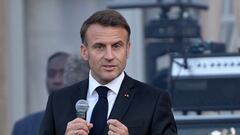 France's President Emmanuel Macron speaks during the annual "Fete de la musique" one-day music festival in the courtyard of the Elysee presidential palace in Paris, France, on June 21, 2024. BERTRAND GUAY/Pool via REUTERS