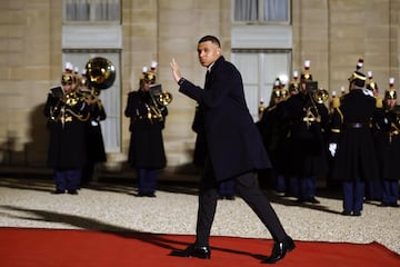 Kylian Mbappe arrives at the Elysee Palace for an official dinner.