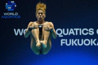 La cubana Prisis Ruiz compite en la preliminar de la prueba de trampolín femenino de un metro en la primera jornada de los Mundiales de Natación que se están disputando en Fukuoka (Japón). En el rostro de la atleta
se puede apreciar claramente la concentración y el esfuerzo que la prueba requiere.
