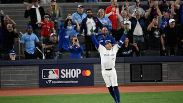 Oct 20, 2025; Toronto, Ontario, CAN; Toronto Blue Jays right fielder George Springer (4) celebrates as he runs the bases after hitting a three run home run against the Seattle Mariners in the seventh inning during game seven of the ALCS round for the 2025 MLB playoffs at Rogers Centre. Mandatory Credit: Dan Hamilton-Imagn Images