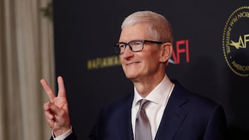 FILE PHOTO: Apple's CEO Tim Cook attends the American Film Institute (AFI) Awards Luncheon in Los Angeles, California, U.S., January 9, 2026. REUTERS/Mario Anzuoni/File Photo
