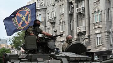 Fighters of Wagner private mercenary group are seen atop of a tank while being deployed near the headquarters of the Southern Military District in the city of Rostov-on-Don, Russia, June 24, 2023. REUTERS/Stringer