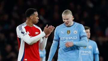Soccer Football - Premier League - Arsenal v Manchester City - Emirates Stadium, London, Britain - February 2, 2025 Arsenal's Gabriel celebrates after Ethan Nwaneri scores their fifth goal as Manchester City's Erling Haaland looks dejected Action Images via Reuters/Peter Cziborra EDITORIAL USE ONLY. NO USE WITH UNAUTHORIZED AUDIO, VIDEO, DATA, FIXTURE LISTS, CLUB/LEAGUE LOGOS OR 'LIVE' SERVICES. ONLINE IN-MATCH USE LIMITED TO 120 IMAGES, NO VIDEO EMULATION. NO USE IN BETTING, GAMES OR SINGLE CLUB/LEAGUE/PLAYER PUBLICATIONS. PLEASE CONTACT YOUR ACCOUNT REPRESENTATIVE FOR FURTHER DETAILS..