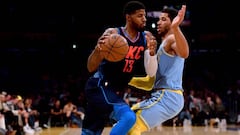 LOS ANGELES, CA - JANUARY 03: Paul George #13 of the Oklahoma City Thunder drives on Josh Hart #5 of the Los Angeles Lakers during the first half at Staples Center on January 3, 2018 in Los Angeles, California.   Harry How/Getty Images/AFP
 == FOR NEWSPAPERS, INTERNET, TELCOS &amp; TELEVISION USE ONLY ==